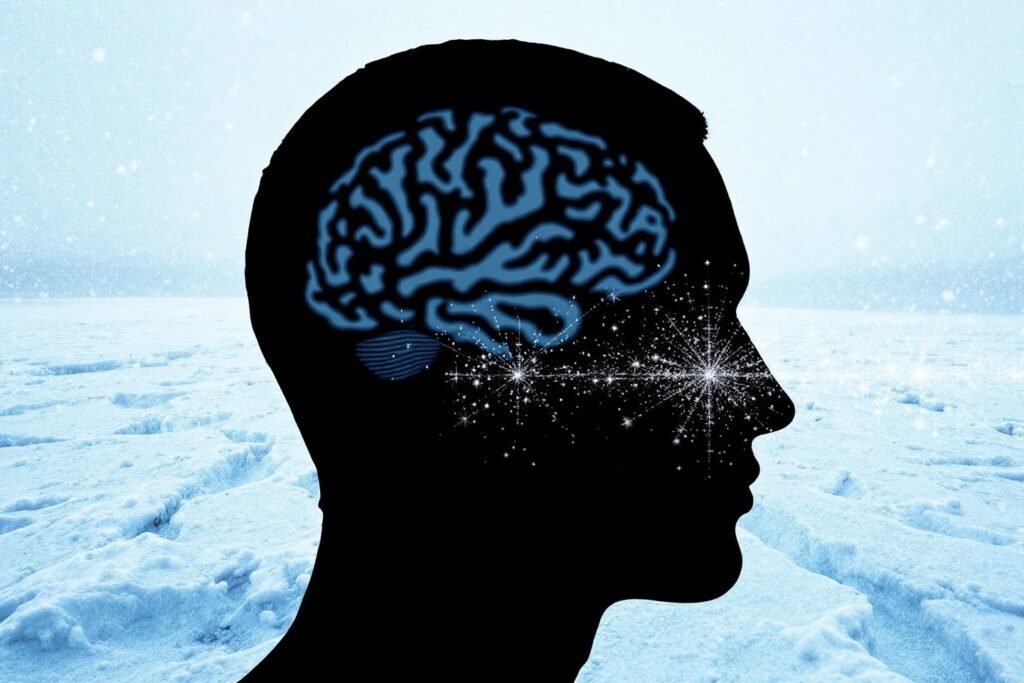 Ilustración de un cerebro con destellos de frío o energía, simbolizando la memoria del frío que activa el metabolismo.